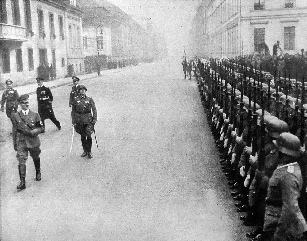 Adolf Hitler inspects the honor guard after the New Year reception for diplomats in Berlin